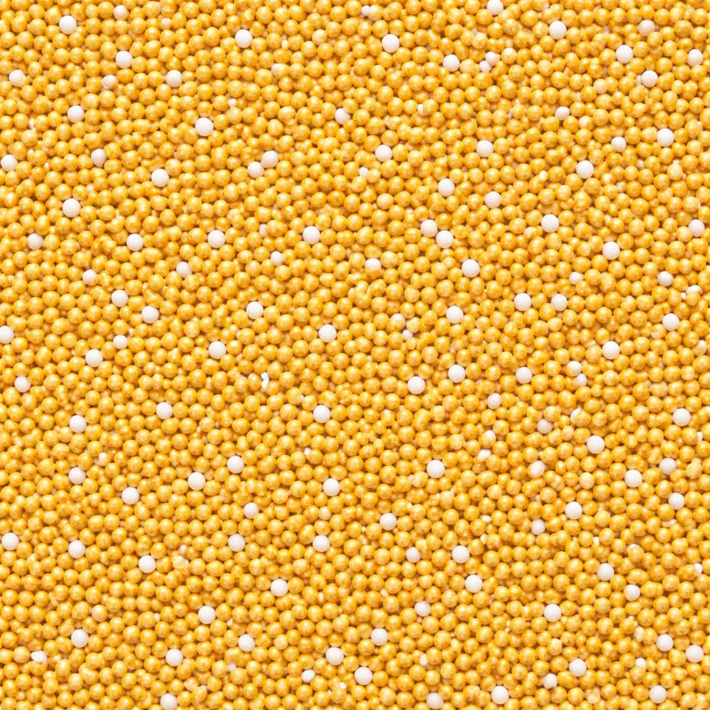 Close-up bird’s-eye view of yellow slow-release fertiliser granules used for hedge planting and long-term nutrient release